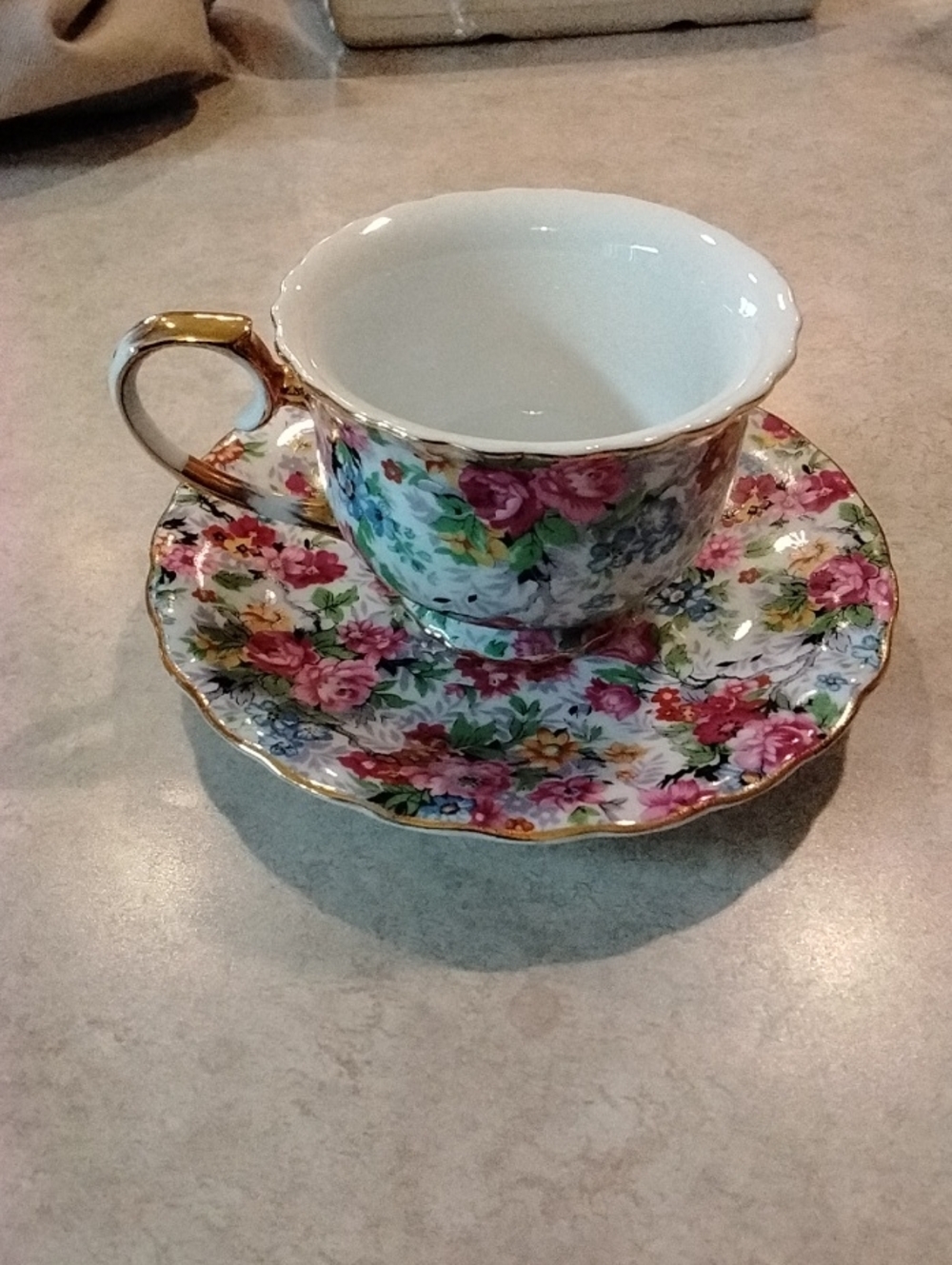 Vintage Style Two's Company Floral Chintz Porcelain Gold Trim Teacup and Saucer